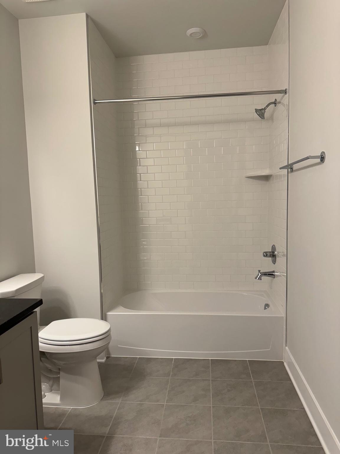 9779 Azure Alley Bethesda, MD 20817 - Photo 32 of 48 Tub in 2nd level hall bathroom