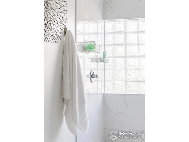 a picture of a bathroom with a window