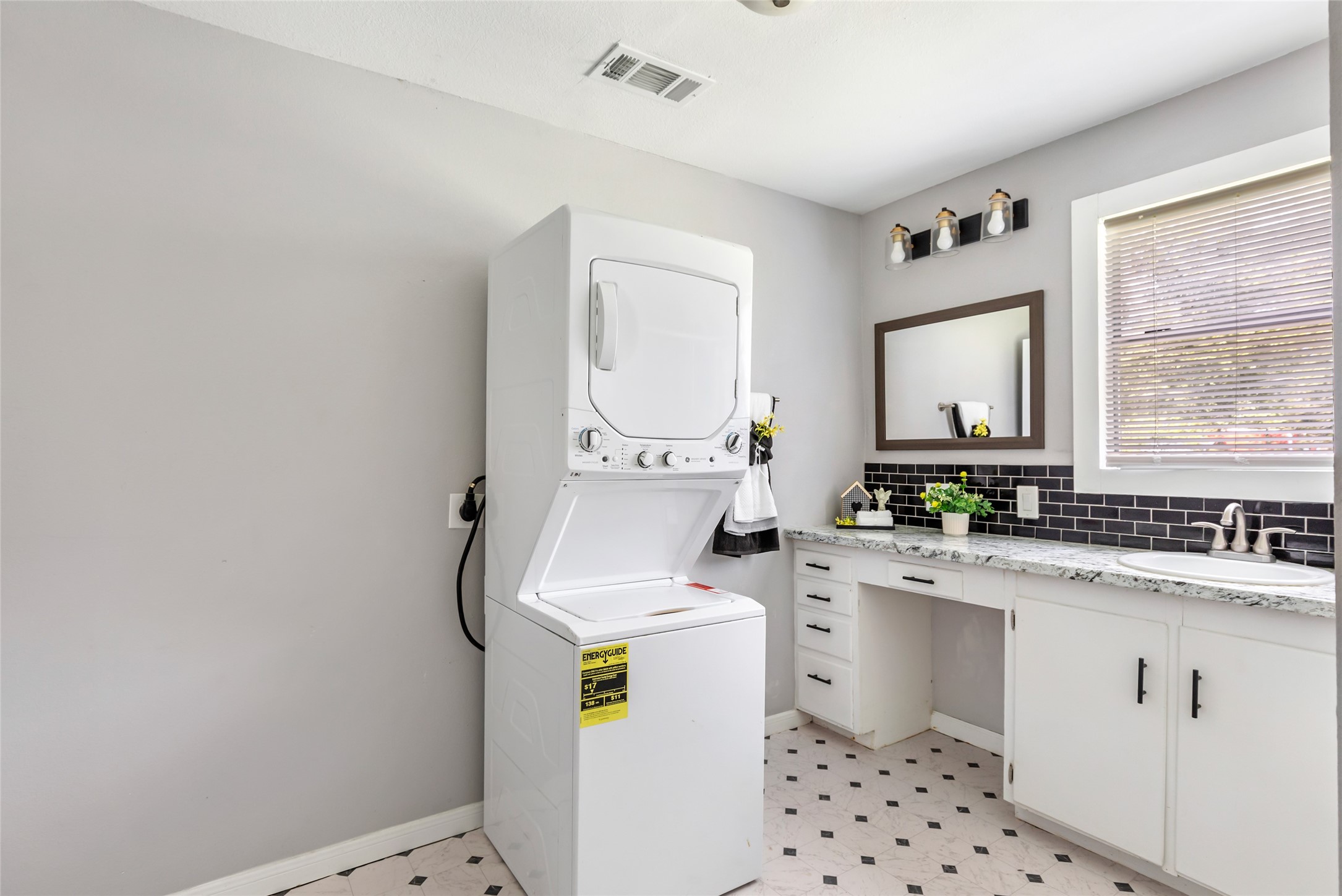 26864 Morgan Cemetery Road Cleveland, TX 77328 - Photo 16 of 26 a bathroom with a sink a toilet and a mirror
