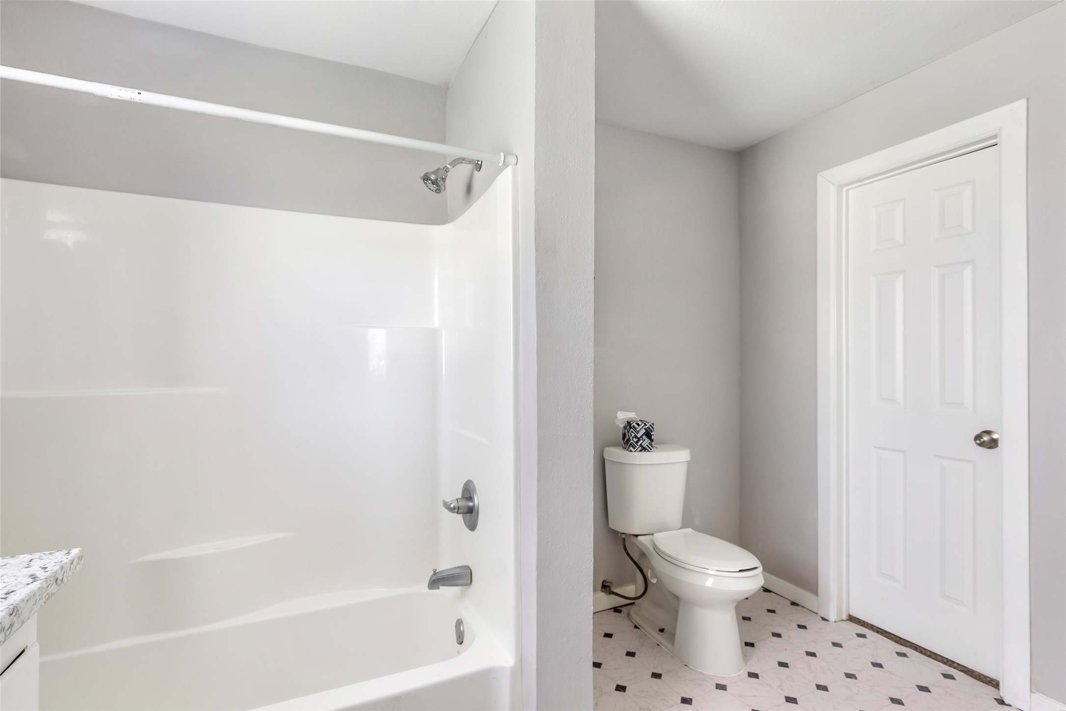 26864 Morgan Cemetery Road Cleveland, TX 77328 - Photo 17 of 26 a bathroom with a toilet and a shower