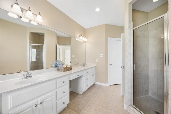 a bathroom with a bathtub and a sink