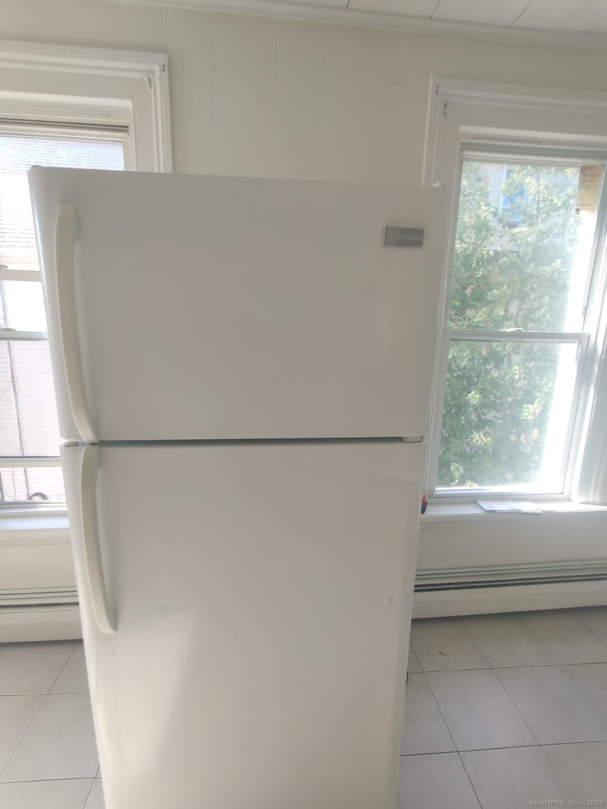 322 Catherine Street Bridgeport, CT 06604 - Photo 13 of 28 a view of a closet from a window