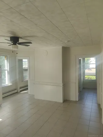 a view of an empty room and window