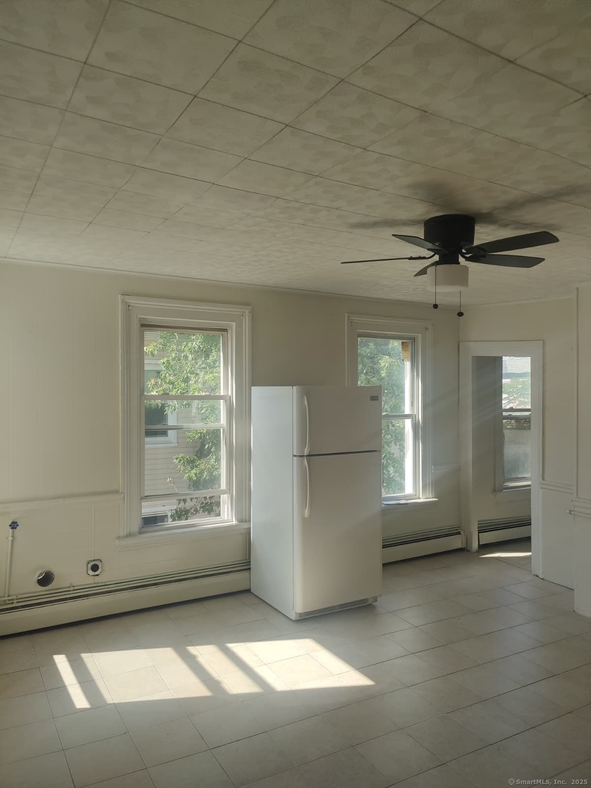 322 Catherine Street Bridgeport, CT 06604 - Photo 17 of 28 an empty room with windows