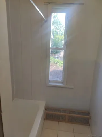 a bathroom with a bathtub