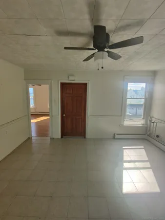 a view of an empty room and window