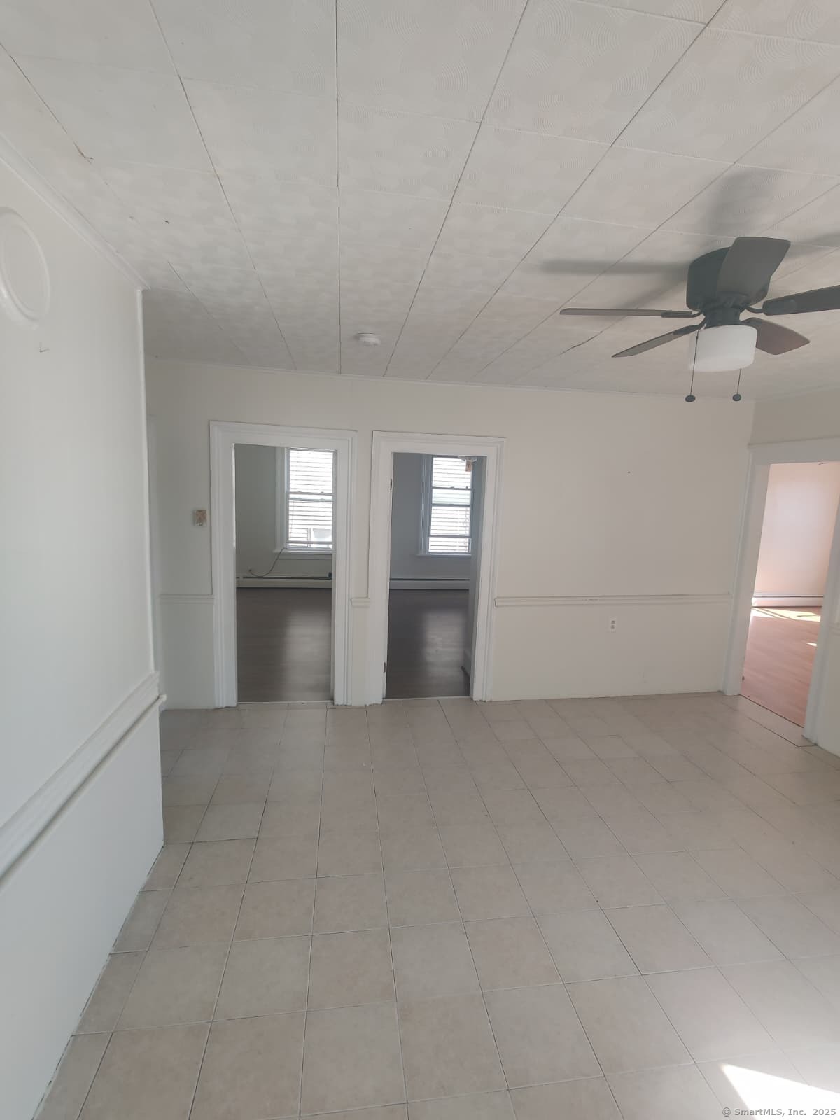 322 Catherine Street Bridgeport, CT 06604 - Photo 9 of 28 a view of an empty room with window and cabinet