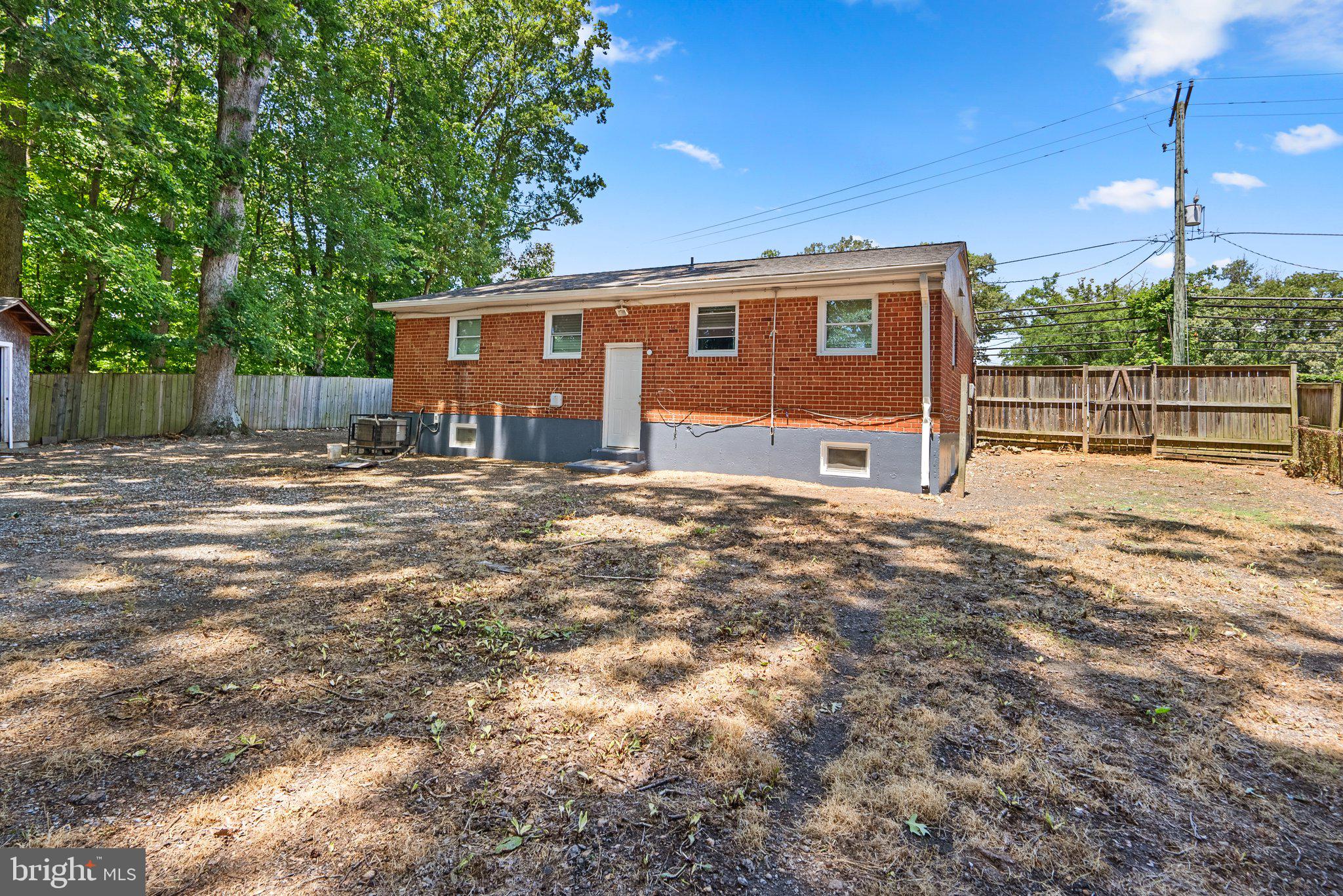 2601 Tucker Road Fort Washington, MD 20744 - Photo 29 of 30 a view of a house with a yard and wooden fence