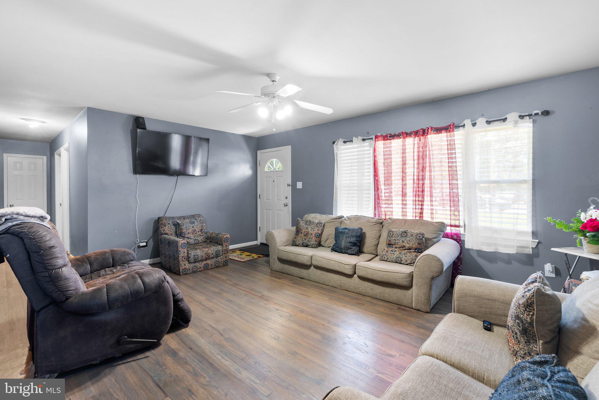 2601 Tucker Road Fort Washington, MD 20744 - Photo 8 of 30 a living room with furniture and a flat screen tv