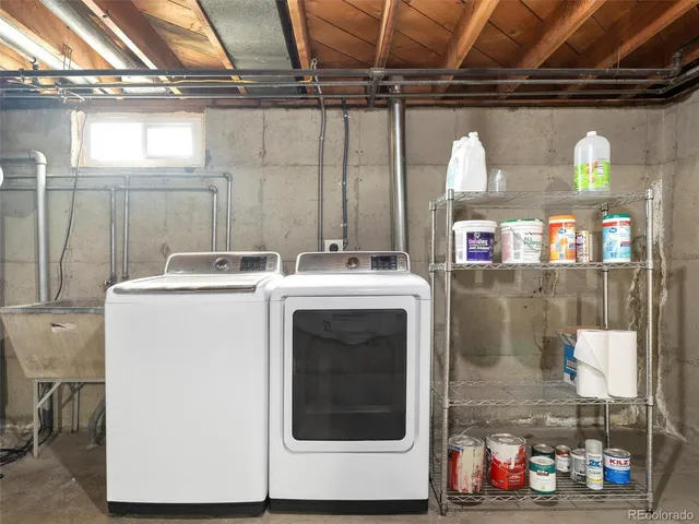 a utility room with dryer and washer