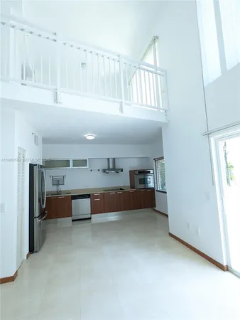 a view of kitchen with furniture and window