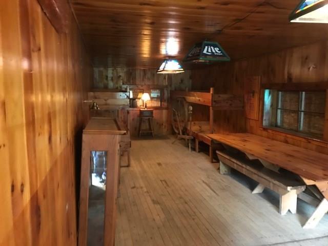 341 Schoodic Lake Road Brownville, ME 04414 - Photo 28 of 56 Bunkroom w/Big Table