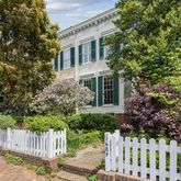 a house view with a garden space