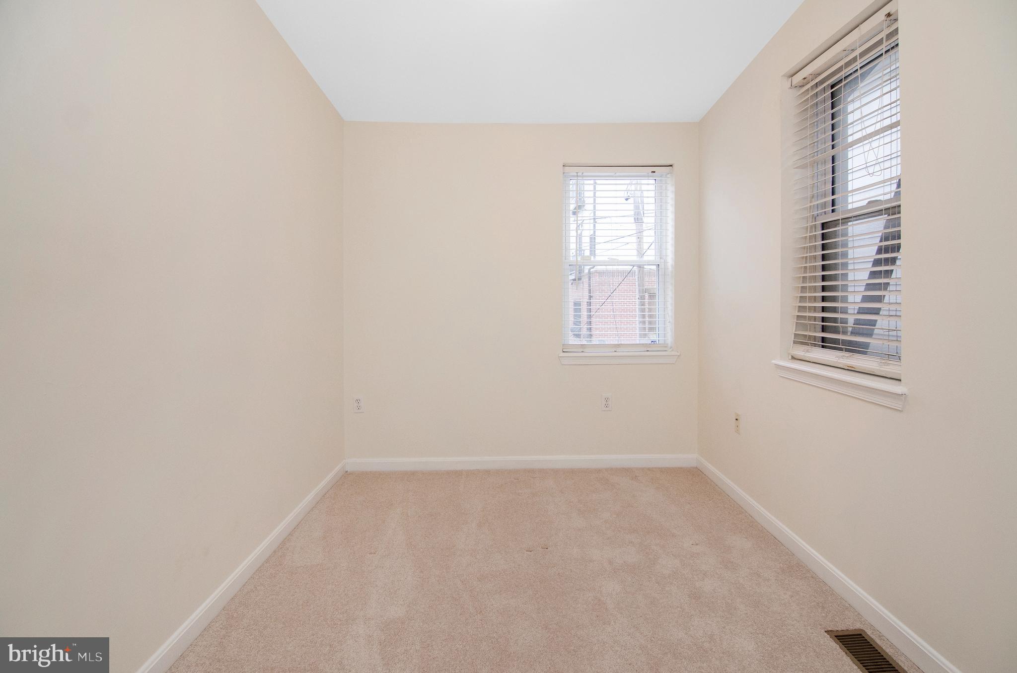 1815 South Charles Street Baltimore, MD 21230 - Photo 18 of 27 an empty room with windows