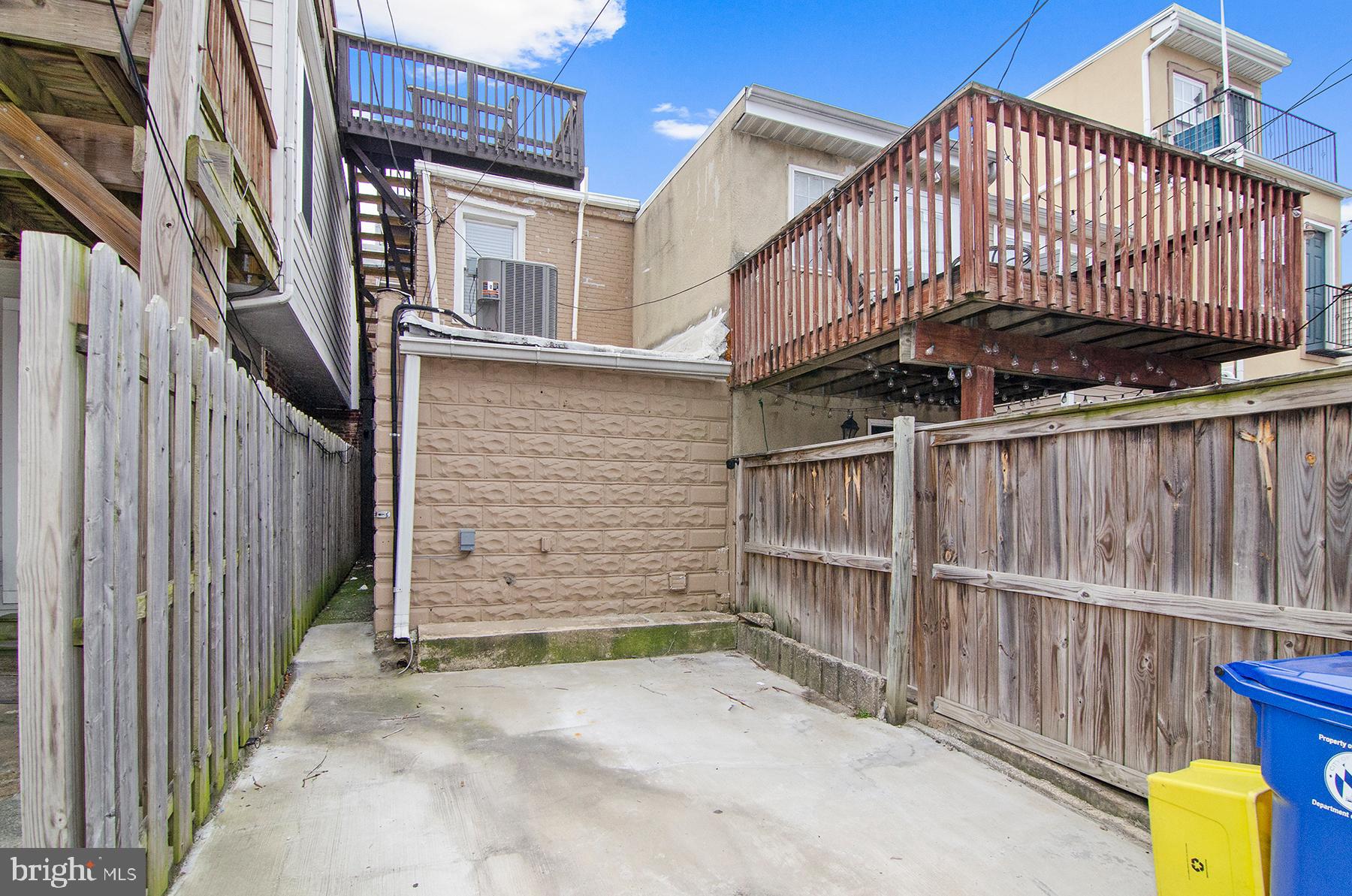 1815 South Charles Street Baltimore, MD 21230 - Photo 20 of 27 a view of a house with wooden stairs