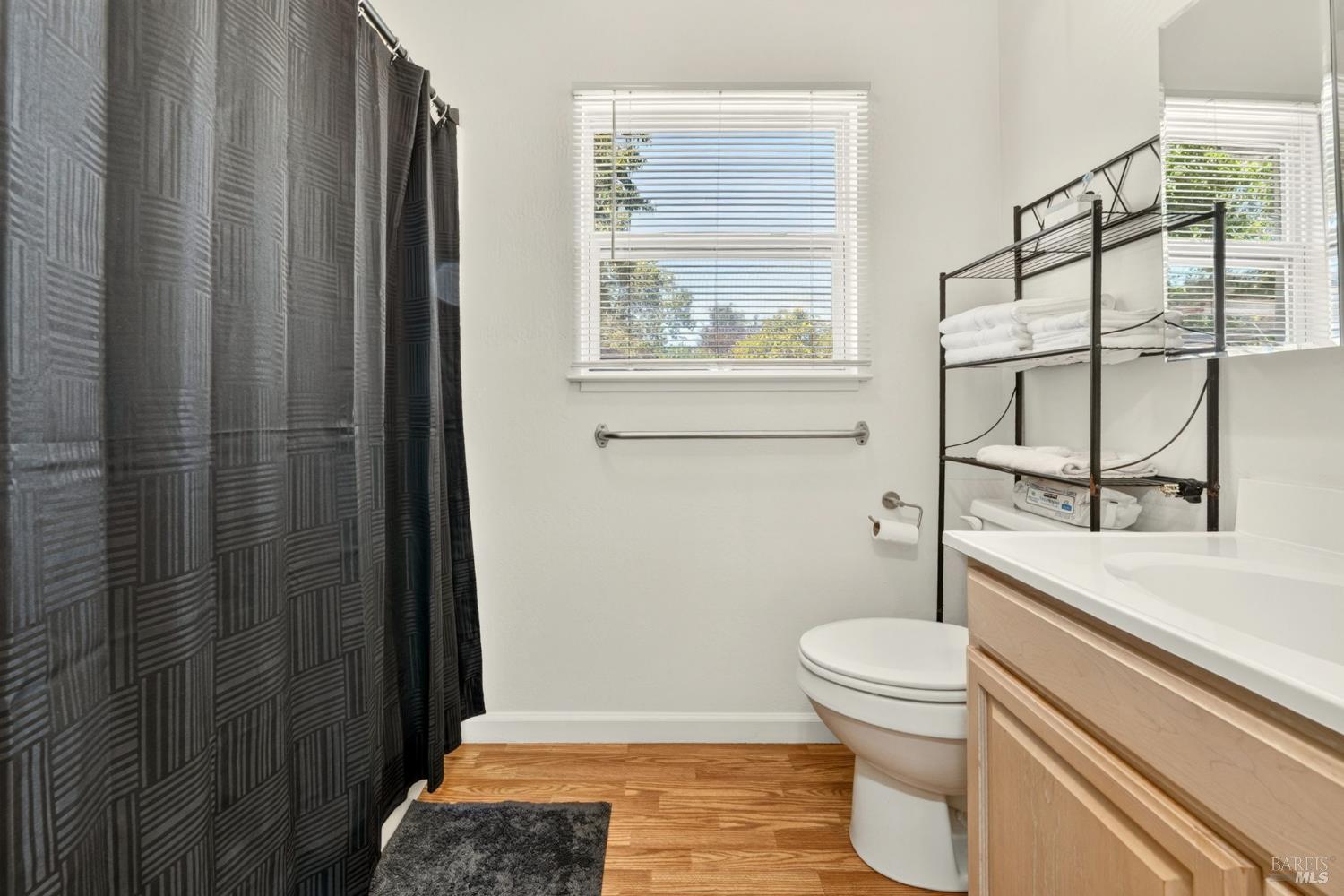 92 Oak Knoll Road Ukiah, CA 95482 - Photo 18 of 35 a bathroom with a toilet and a shower