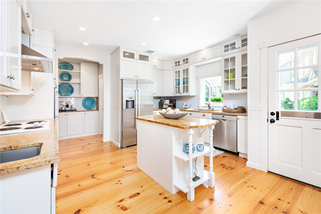 35 Lake Road Narragansett, RI 02882 - Photo 4 of 49 Beautiful Granite Kitchen with floor to ceiling cabinetry and a wonderful Dutch Door
 

