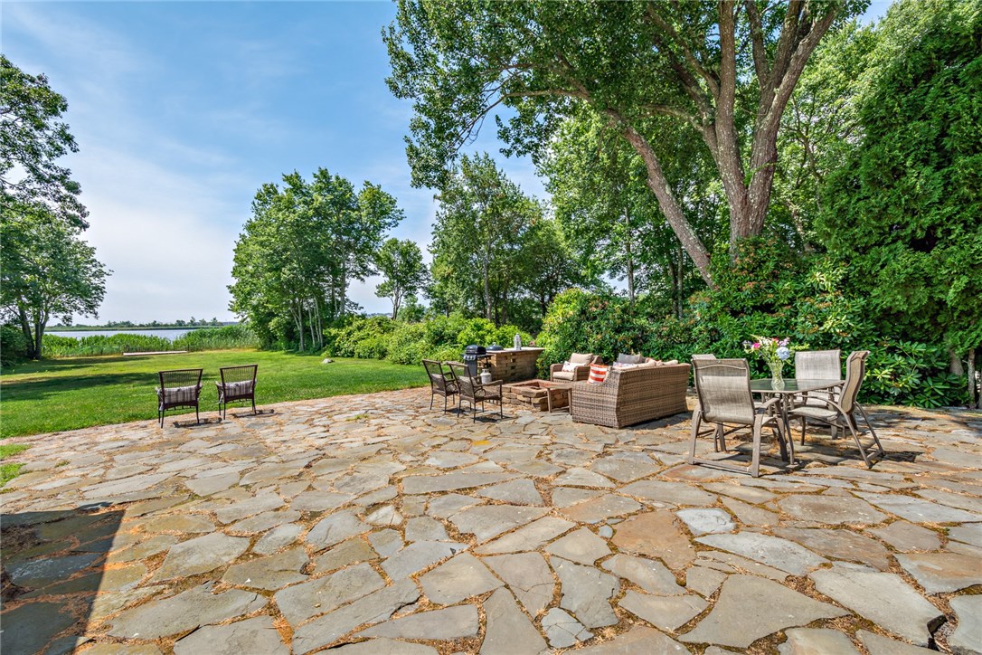 35 Lake Road Narragansett, RI 02882 - Photo 44 of 49 Beautiful backyard that scrolls down to the pond