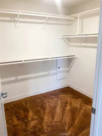 a view of a room with racks on the wall