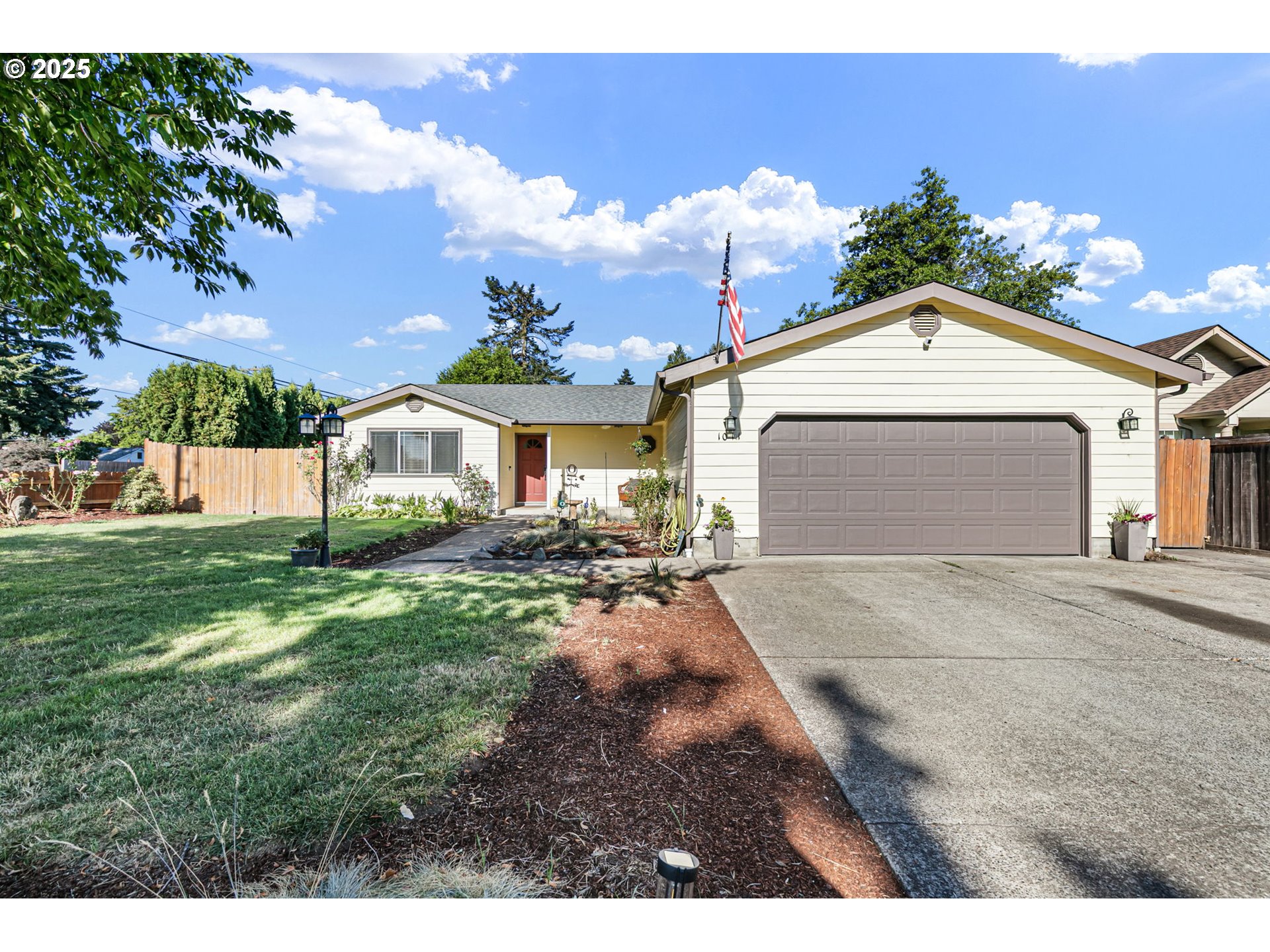 1011 Rose Street Junction City, OR 97448 - Photo 1 of 44 a front view of a house with a yard
