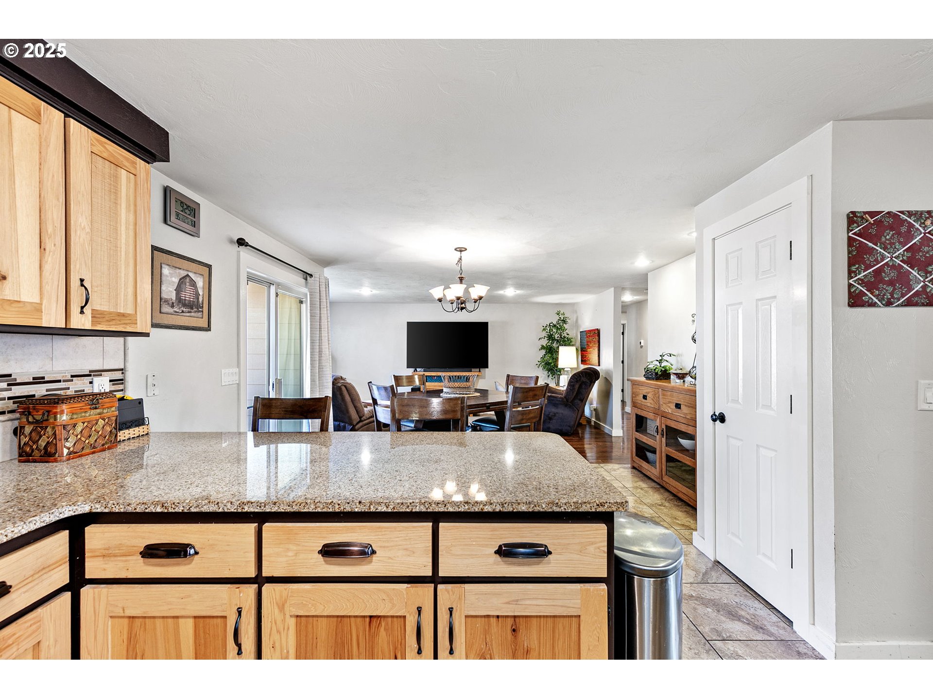 1011 Rose Street Junction City, OR 97448 - Photo 16 of 44 a kitchen with sink cabinets and window