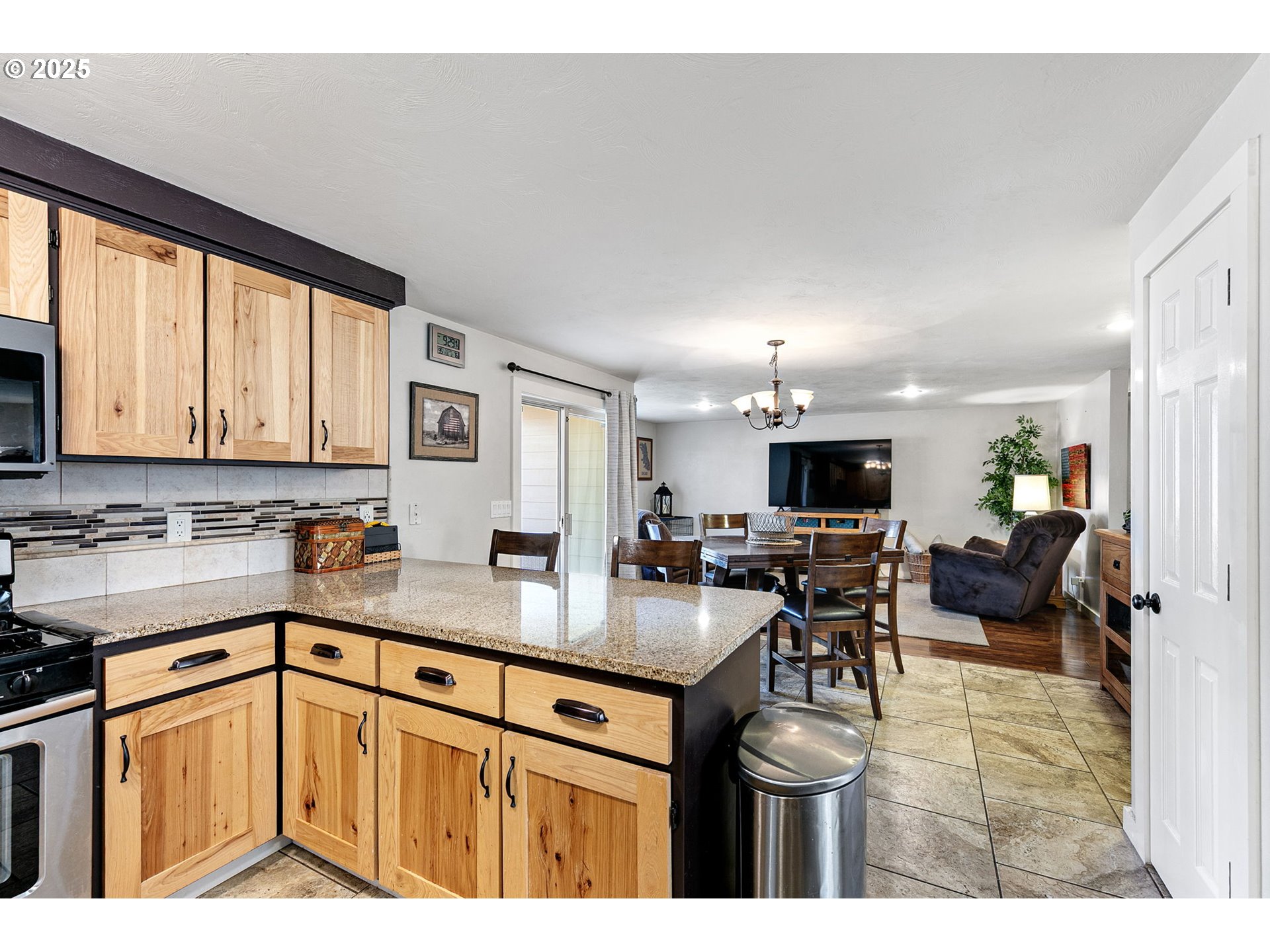 1011 Rose Street Junction City, OR 97448 - Photo 17 of 44 a kitchen with a sink cabinets and window