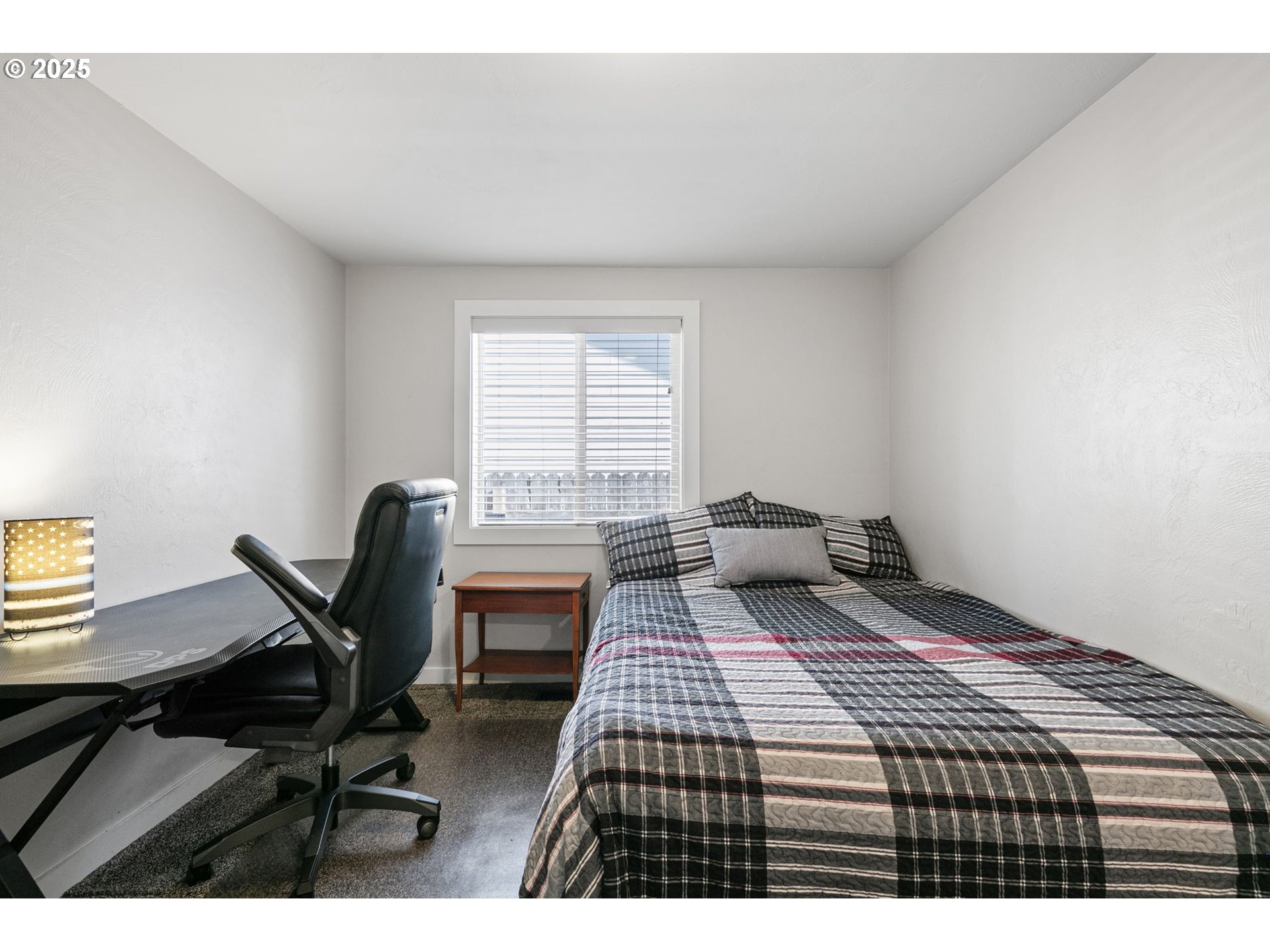 1011 Rose Street Junction City, OR 97448 - Photo 31 of 44 a bedroom with a bed and a desk