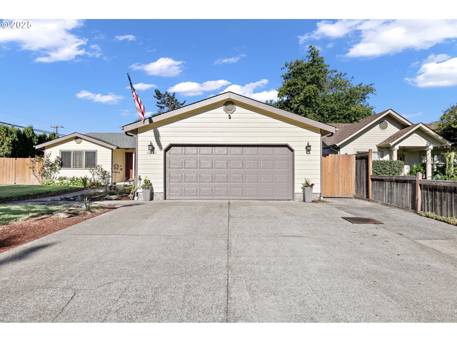 1011 Rose Street Junction City, OR 97448 - Photo 4 of 44 a view of garage and yard