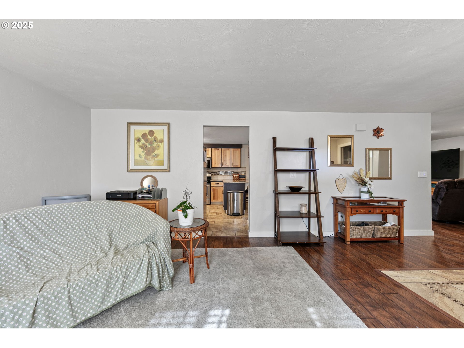 1011 Rose Street Junction City, OR 97448 - Photo 9 of 44 a bedroom with furniture and a wooden floor
