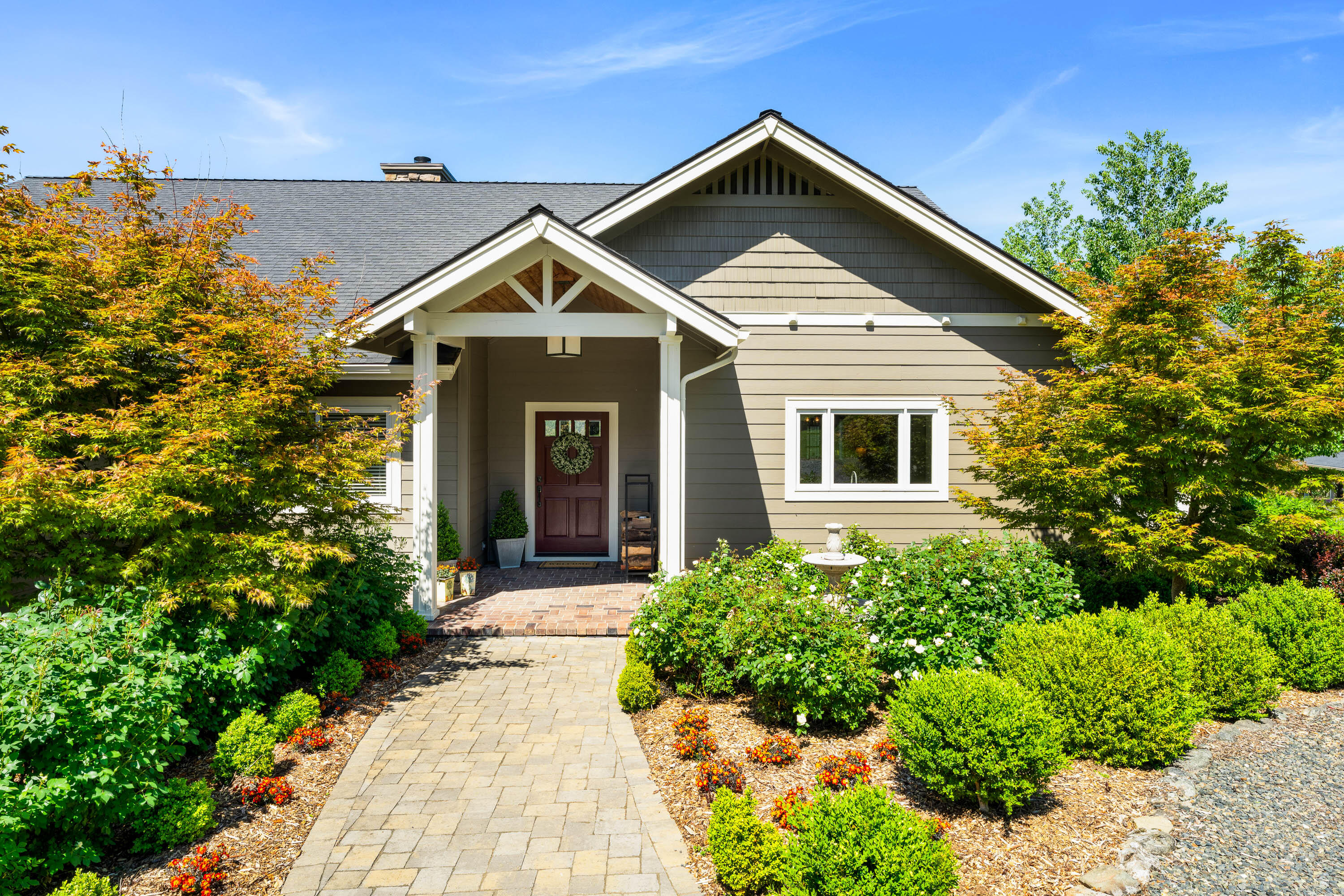 931 Hogan Road Jacksonville, OR 97530 - Photo 44 of 74 a front view of a house with a yard