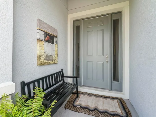 a view of entryway with a front door