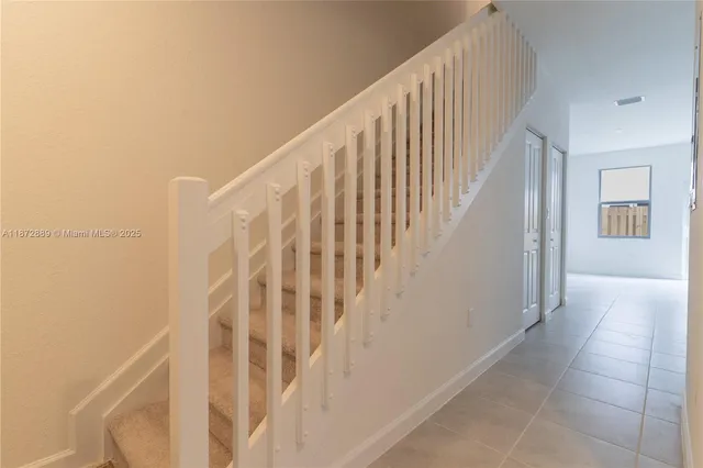 a view of entryway with stairs