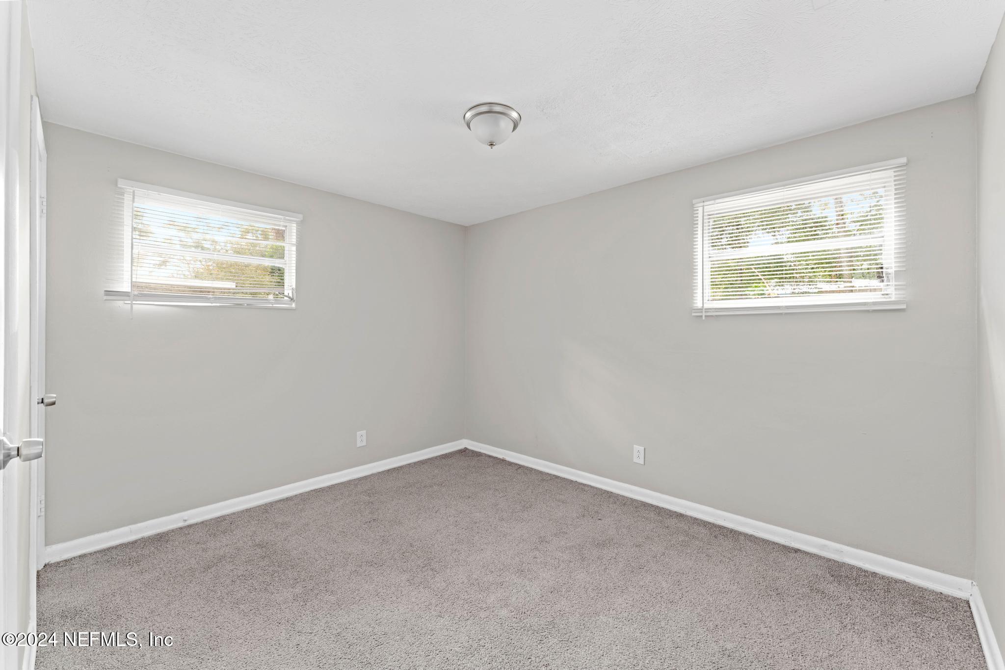 325 Toccoa Road Orange Park, FL 32073 - Photo 11 of 19 an empty room with a window