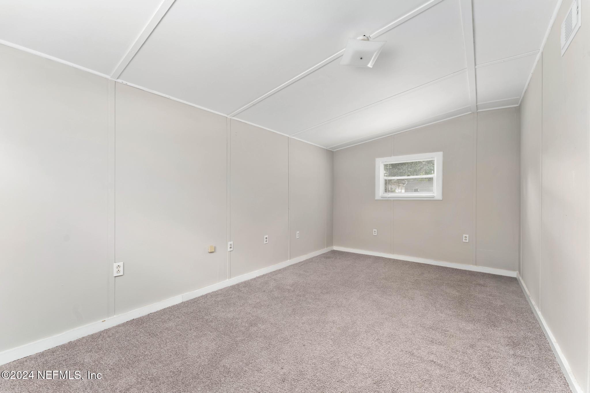 325 Toccoa Road Orange Park, FL 32073 - Photo 14 of 19 an empty room with windows