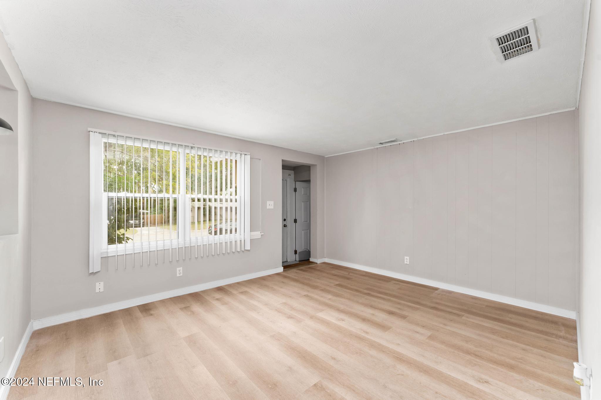 325 Toccoa Road Orange Park, FL 32073 - Photo 6 of 19 a view of an empty room with a window