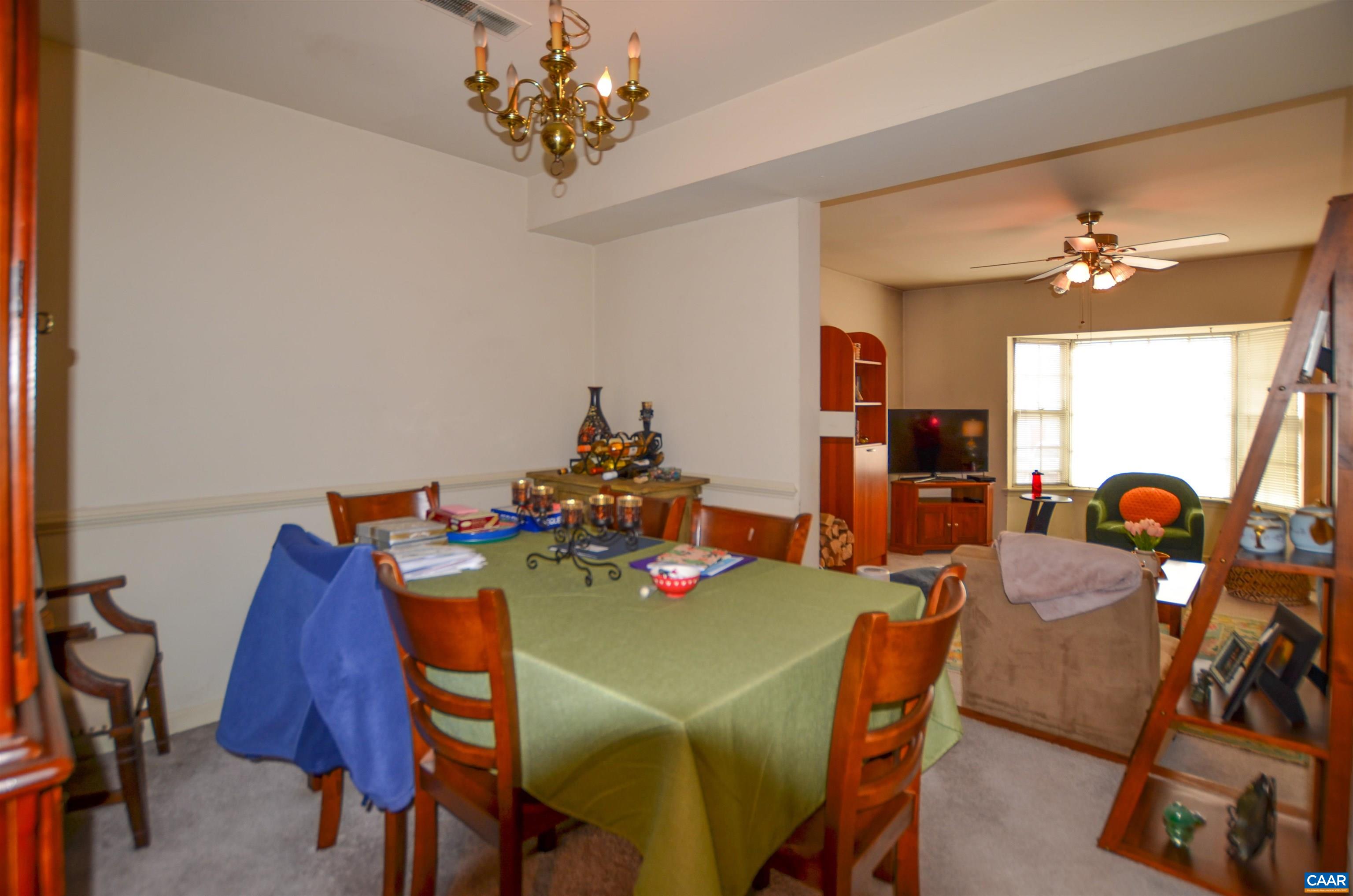 1594 Cool Spring Road Charlottesville, VA 22901 - Photo 5 of 26 a view of a dining room with furniture and chandelier