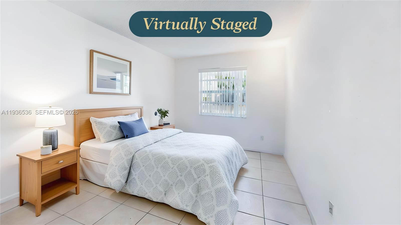 2657 Southeast 19th Court, Unit 103E Homestead, FL 33035 - Photo 22 of 50 a bedroom with a bed and a window