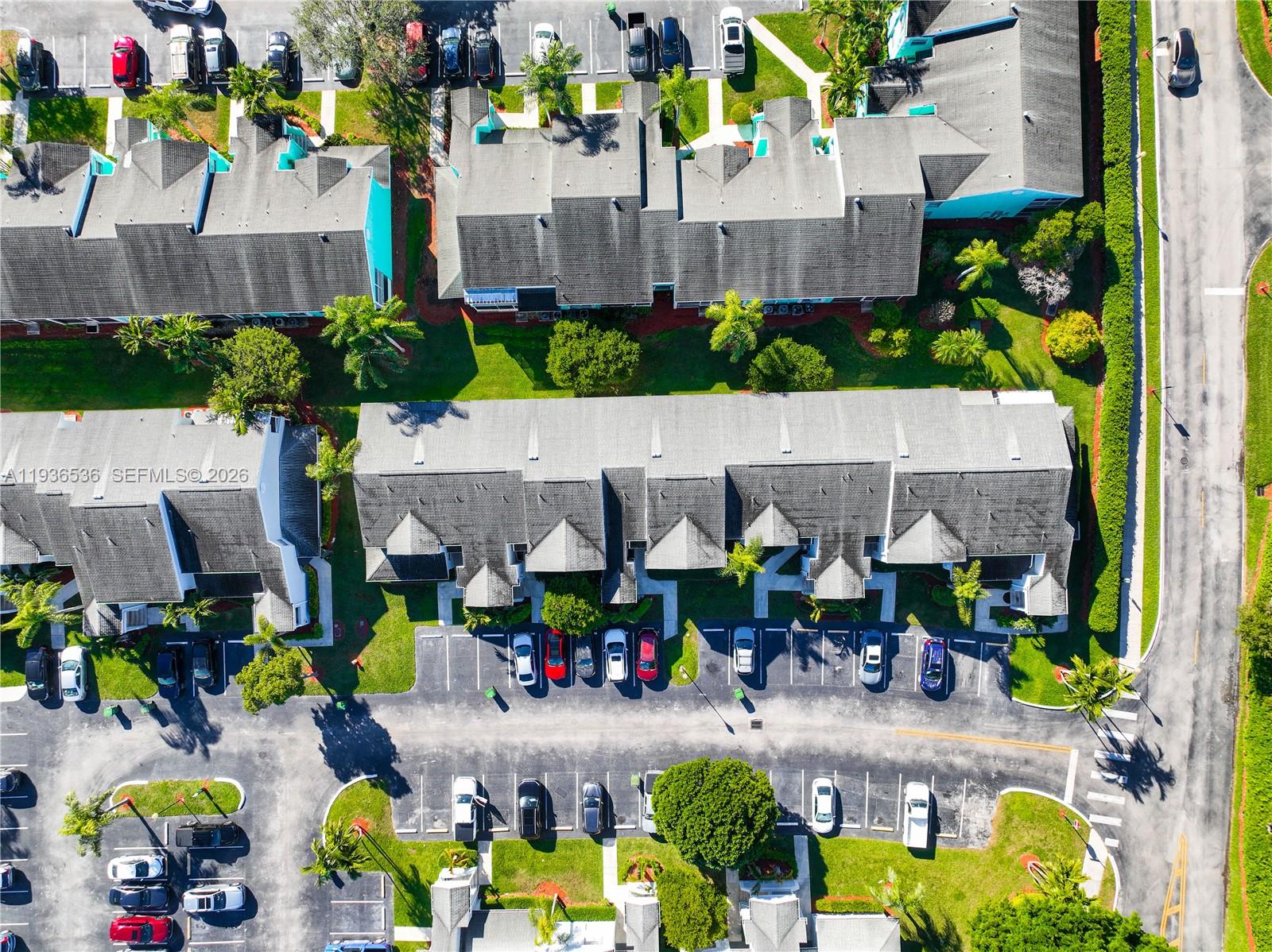 2657 Southeast 19th Court, Unit 103E Homestead, FL 33035 - Photo 31 of 50 a view of yard with outdoor seating and outdoor seating