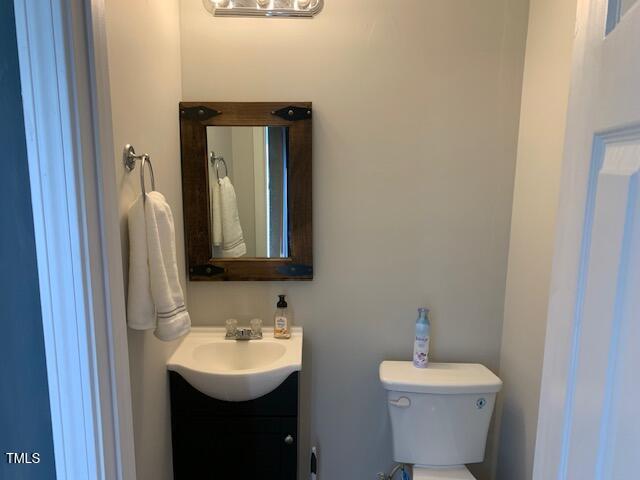 4910 Briarstone Court Raleigh, NC 27610 - Photo 21 of 34 half bath- level 1