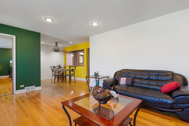 a living room with furniture and a table