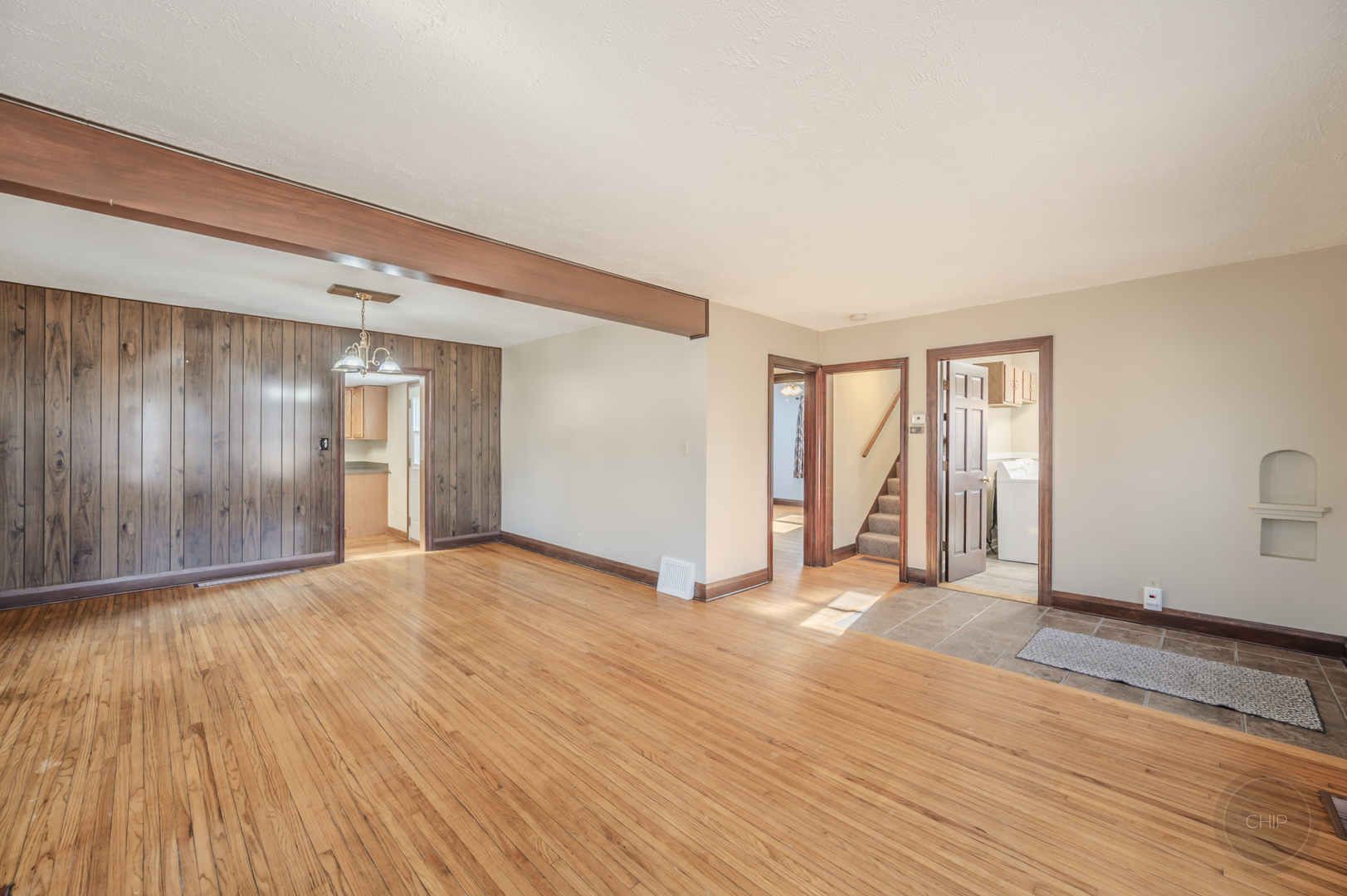 2240 State Rte 31 Oswego, IL 60543 - Photo 11 of 54 a view of an empty room with wooden floor and a window