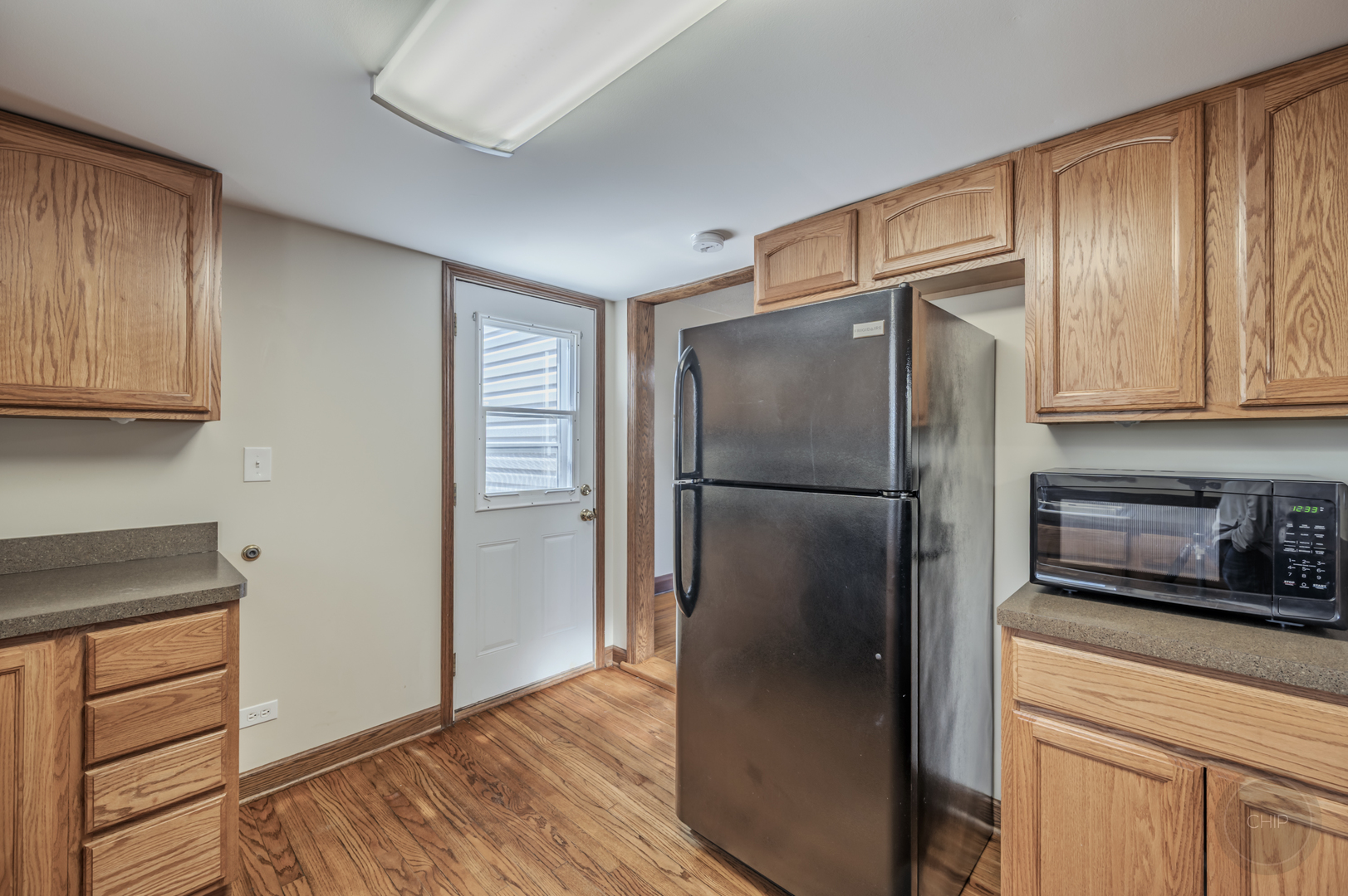 2240 State Rte 31 Oswego, IL 60543 - Photo 16 of 54 a kitchen with stainless steel appliances granite countertop a refrigerator and a stove top oven