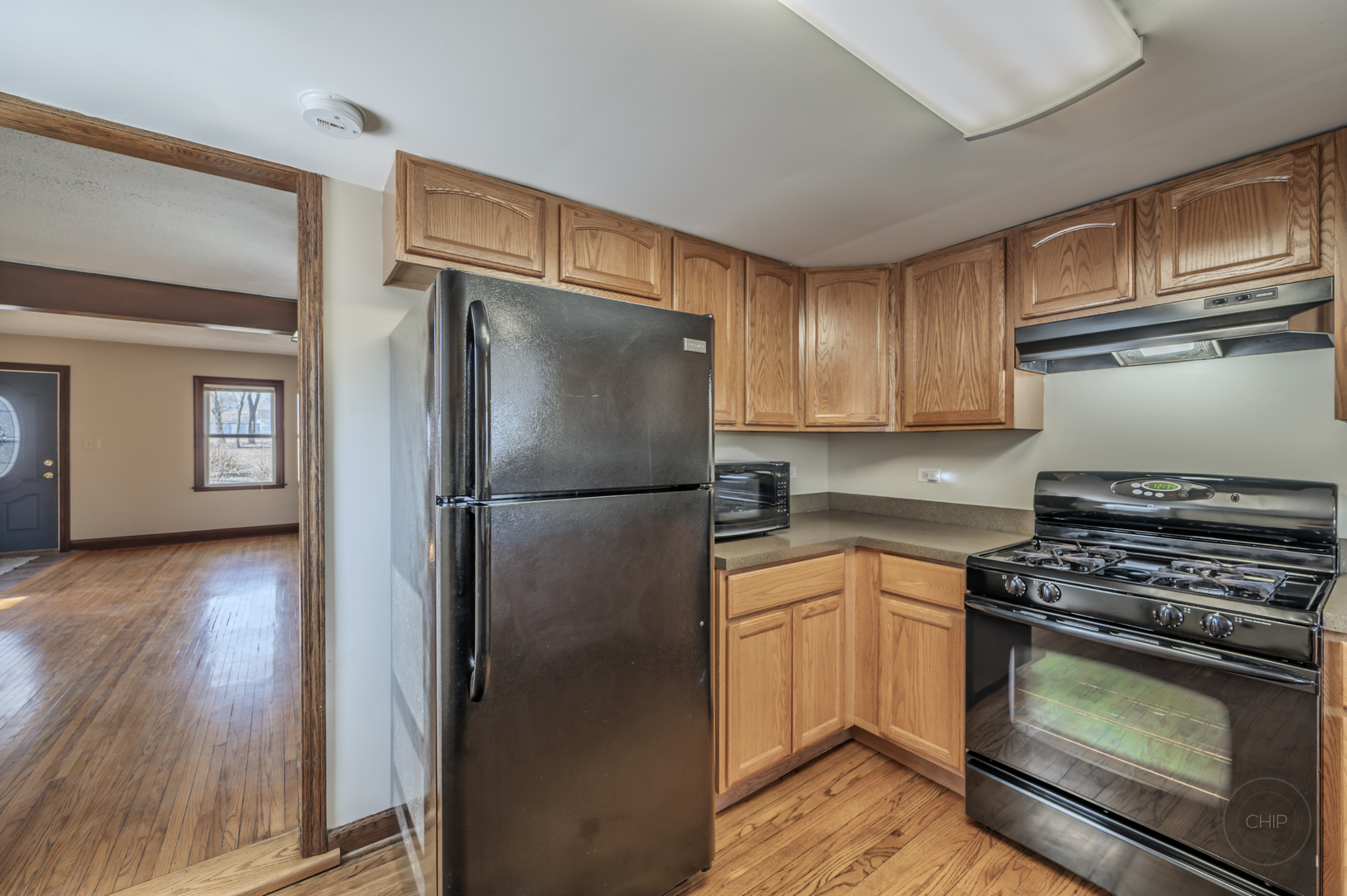2240 State Rte 31 Oswego, IL 60543 - Photo 17 of 54 a kitchen with stainless steel appliances granite countertop a refrigerator stove and sink