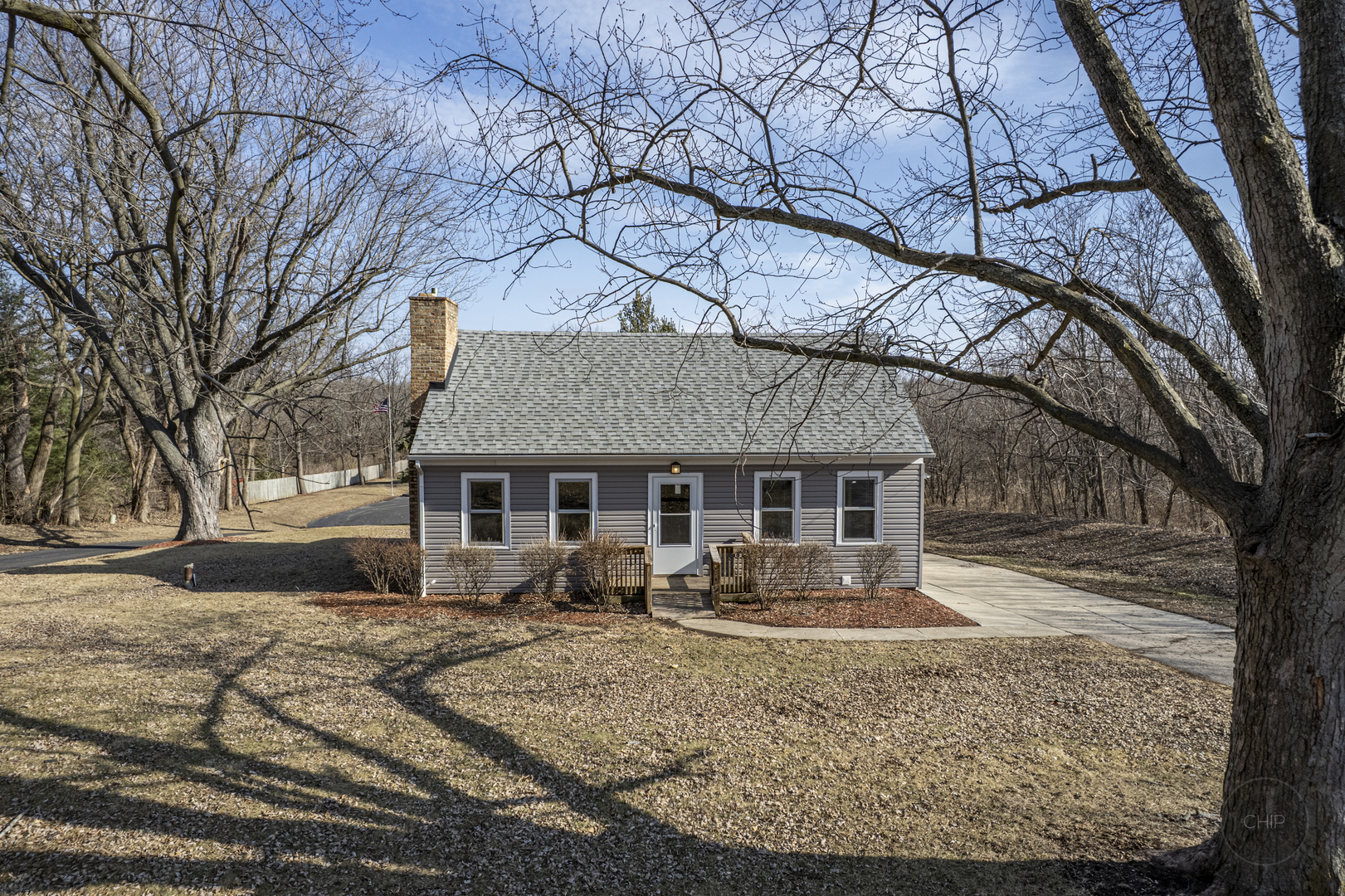 2240 State Rte 31 Oswego, IL 60543 - Photo 2 of 54 a view of a house with a yard covered in snow