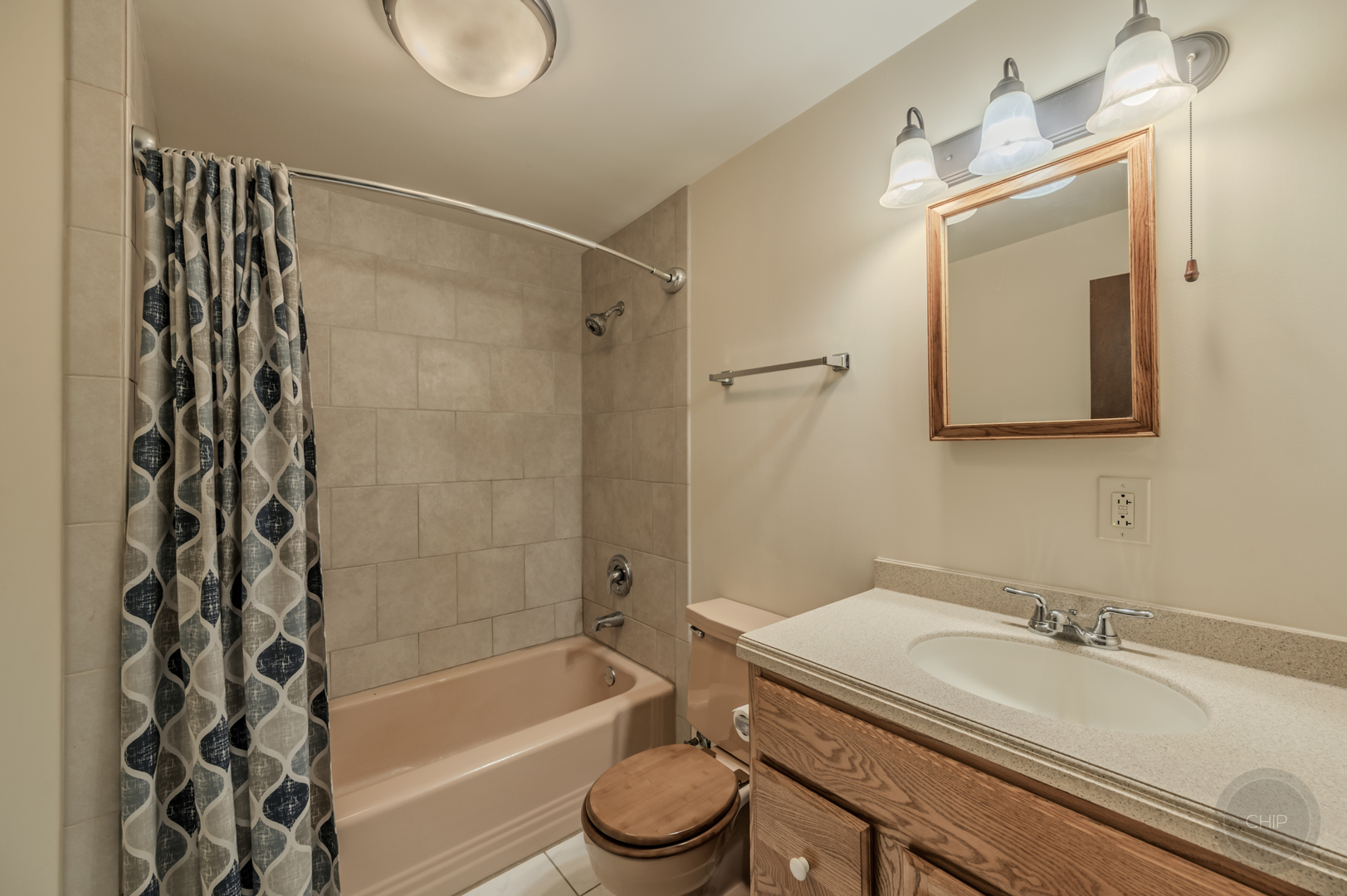 2240 State Rte 31 Oswego, IL 60543 - Photo 33 of 54 a bathroom with a granite countertop sink toilet a mirror and shower