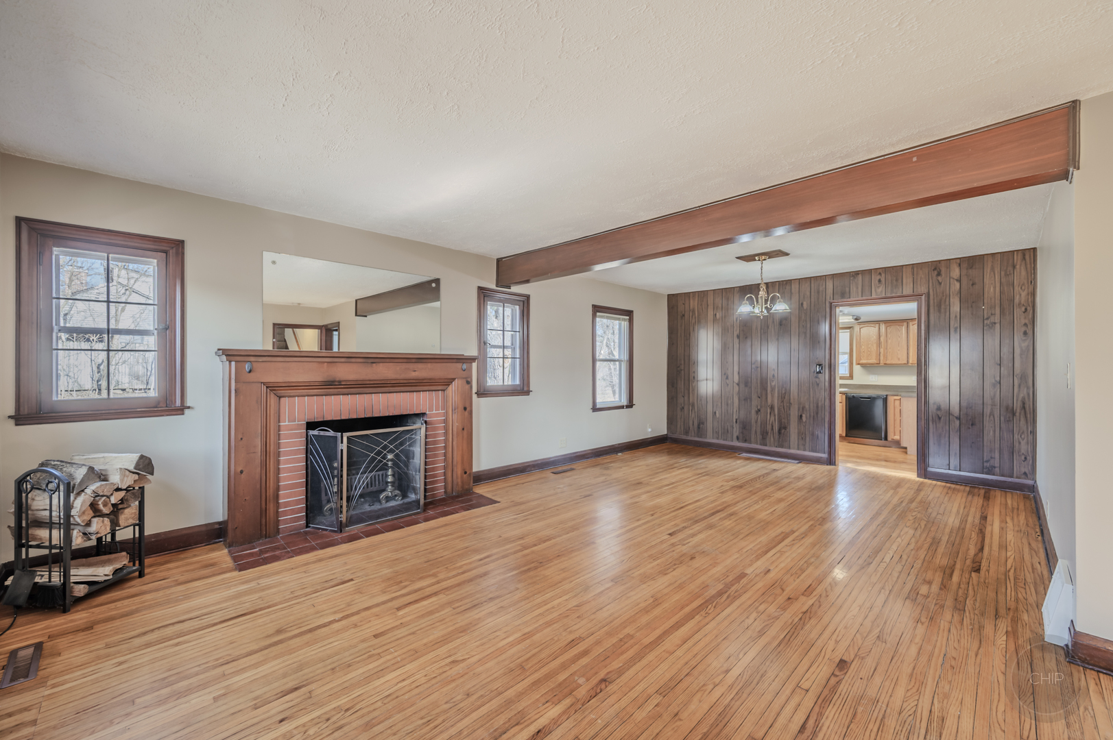 2240 State Rte 31 Oswego, IL 60543 - Photo 7 of 54 a view of empty room with wooden floor and fireplace