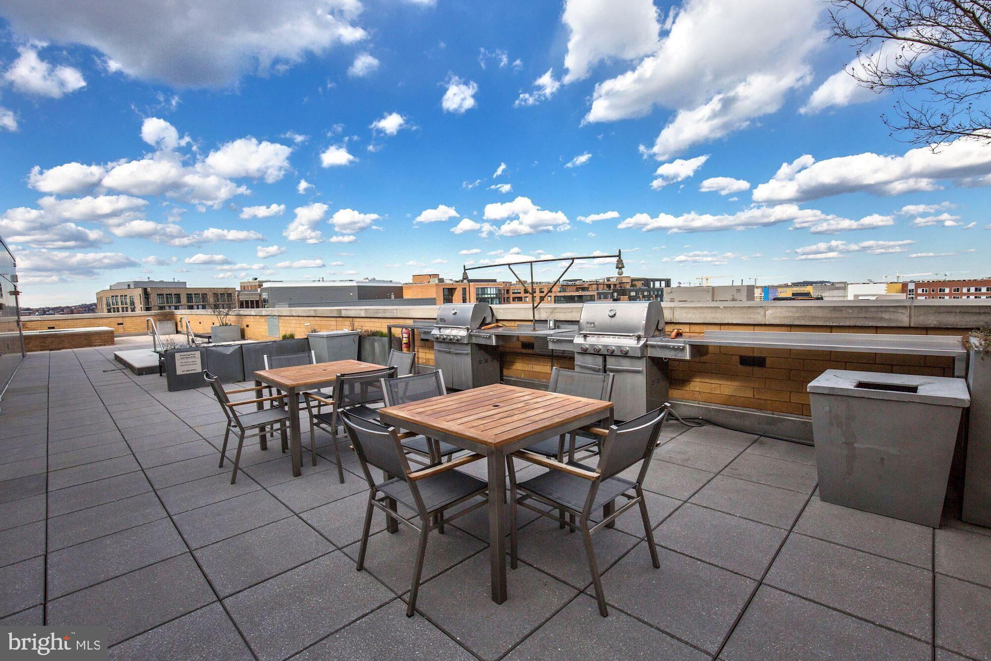 475 K Street Northwest, Unit 908 Washington, DC 20001 - Photo 23 of 31 Rooftop, with grills and tables/chairs!