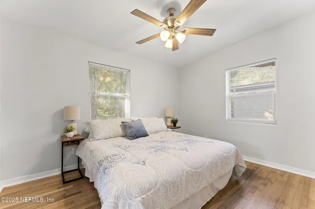 a bathroom with a sink toilet and a mirror