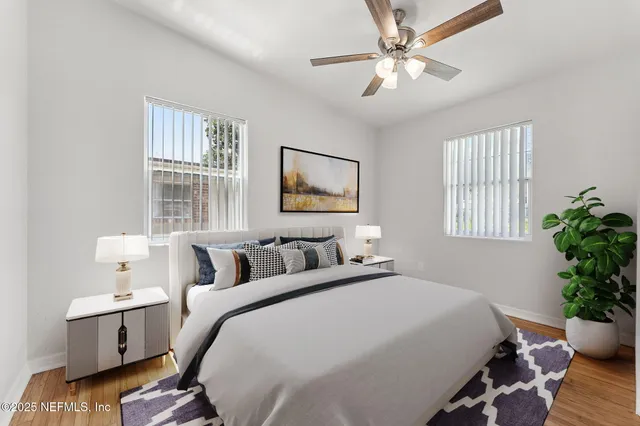 a deck view with wooden floor and fence next to a yard