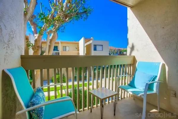 a view of a chairs setting on the deck